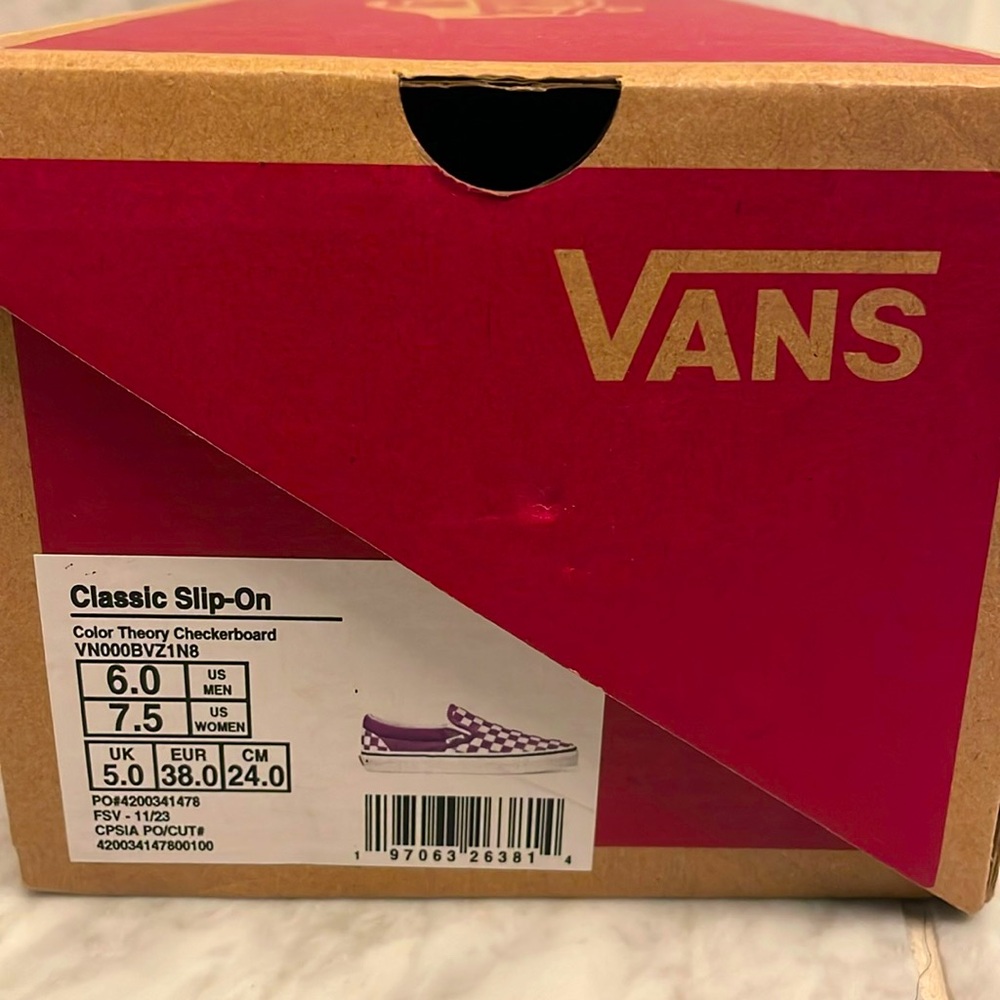 Purple checker Vans slip on shoe.